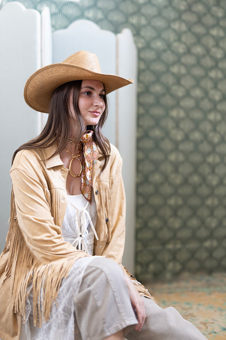 Woman wearing a Brooks Cowboy Straw Hat - Tan and fringe jacket-FleaStyle