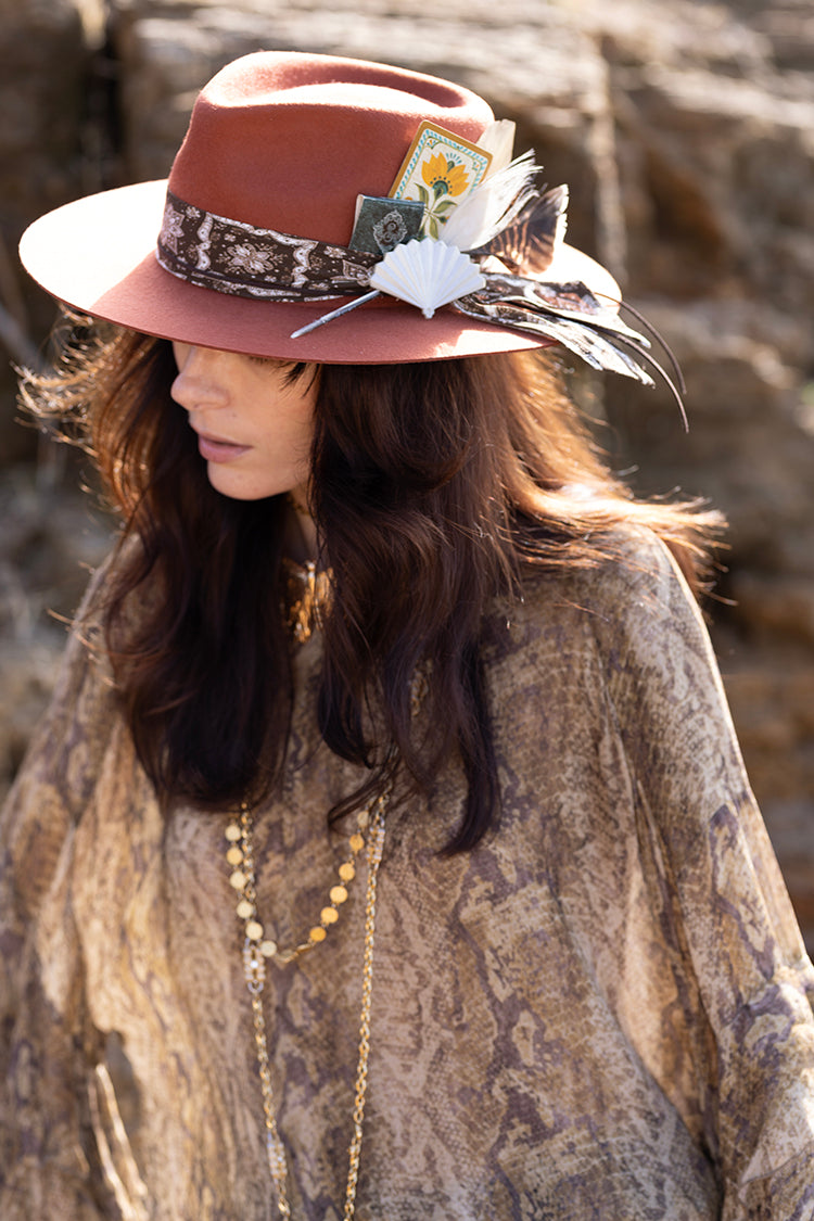 Woman wearing a decorative hat Lenny Wool Short-Brim Hat - Rust-FleaStyle