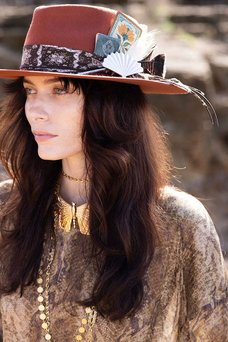 Woman wearing a decorative hat Lenny Wool Short-Brim Hat - Rust-FleaStyle