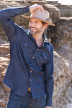Man wearing a blue denim shirt and Lenny Wool Short-Brim Hat - Beige outdoors