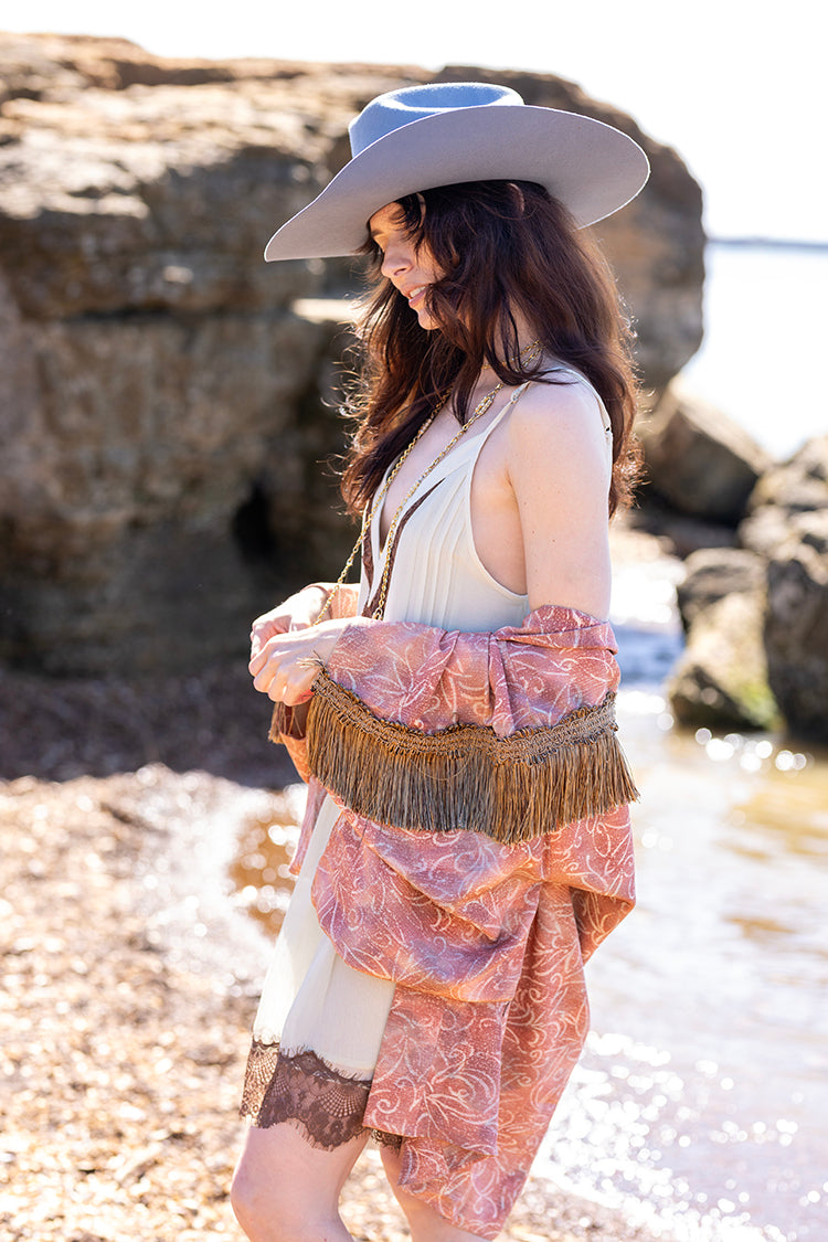 Woman in a Rider Wool Cowboy Hat - Dusty Blue and kimono standing on a rocky beach-FleaStyle