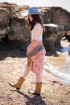 Woman in a Tex-Cowboy-Wool-Hat-DustyBlue-Fleastyle, vintage kimono, and boots standing on a rocky beach-Fleastyle
