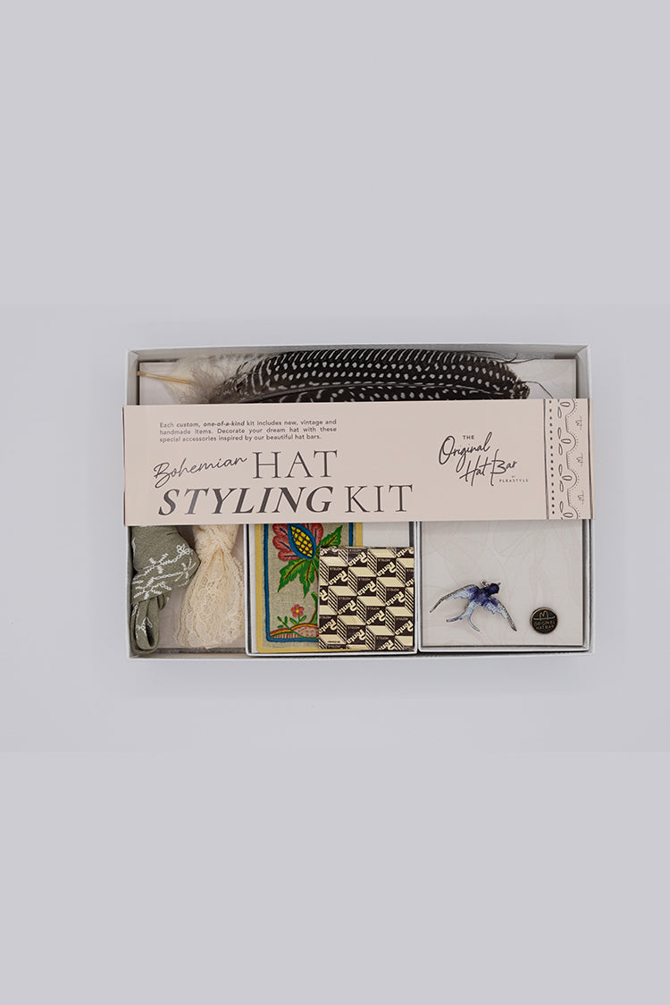 Collection of vintage items including feathers, cards, and a brooch- Bohemian Hat Styling Kit - Blue Hummingbird Brooch