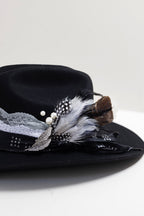 One-of-a-Kind-Custom-Cowboy-Hat-Black with decorative feathers, custom hat bands, vintage brooches and pearl hat pins-FleaStyle